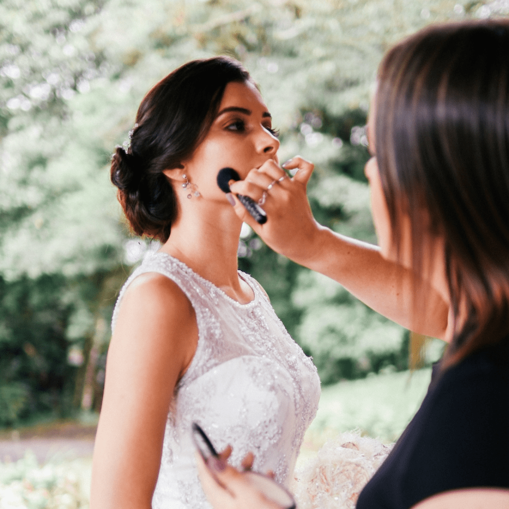Bride with makeup artist